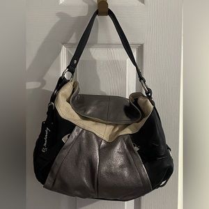 B. Makowsky genuine leather black, silver, and beige magnetic flap hobo bag